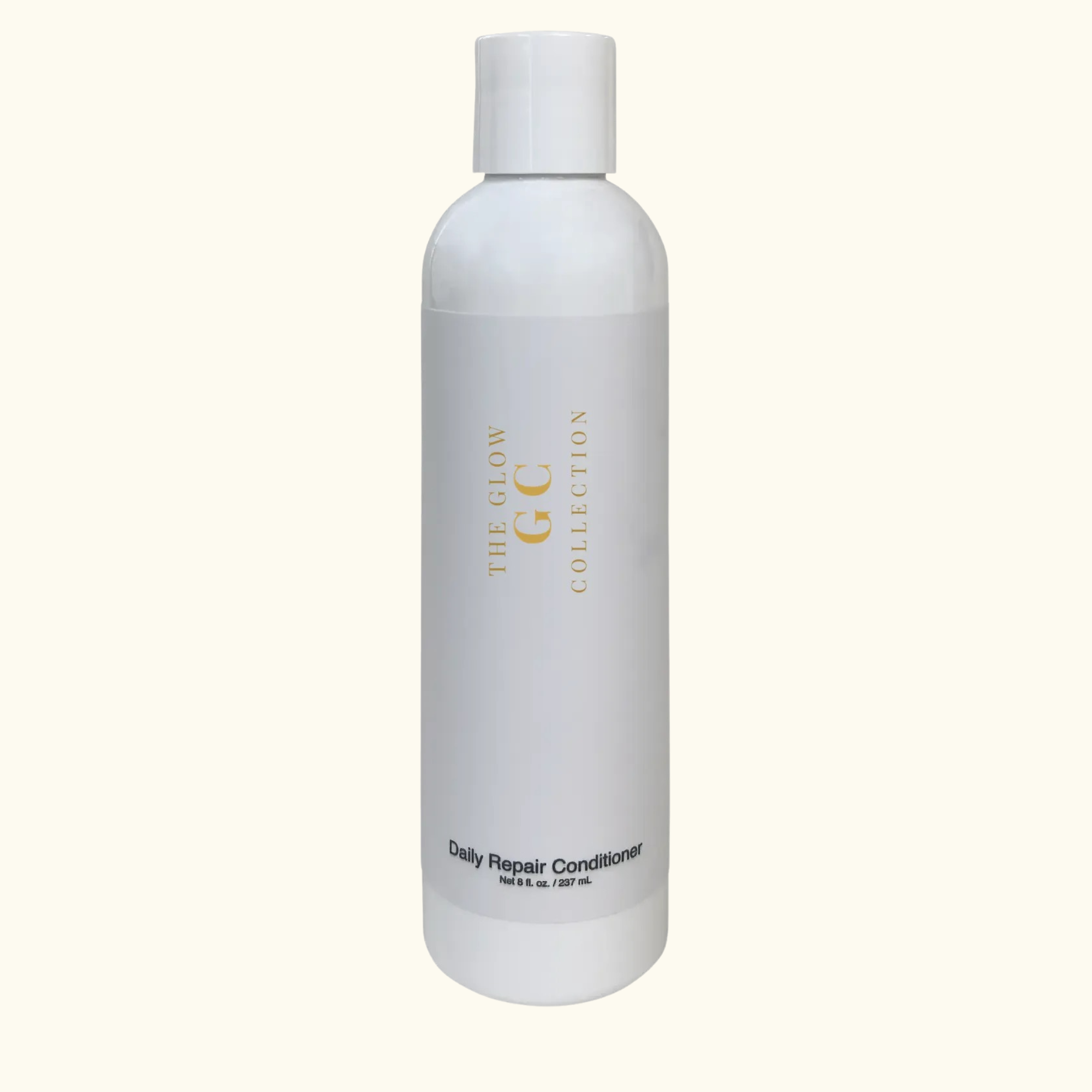 White bottle of 'The Glow Collection' Daily Repair Conditioner on a white background