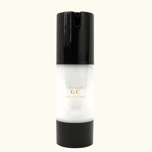 Skincare bottle with black cap and white body displaying 'The Glow GC Collection' on a white background