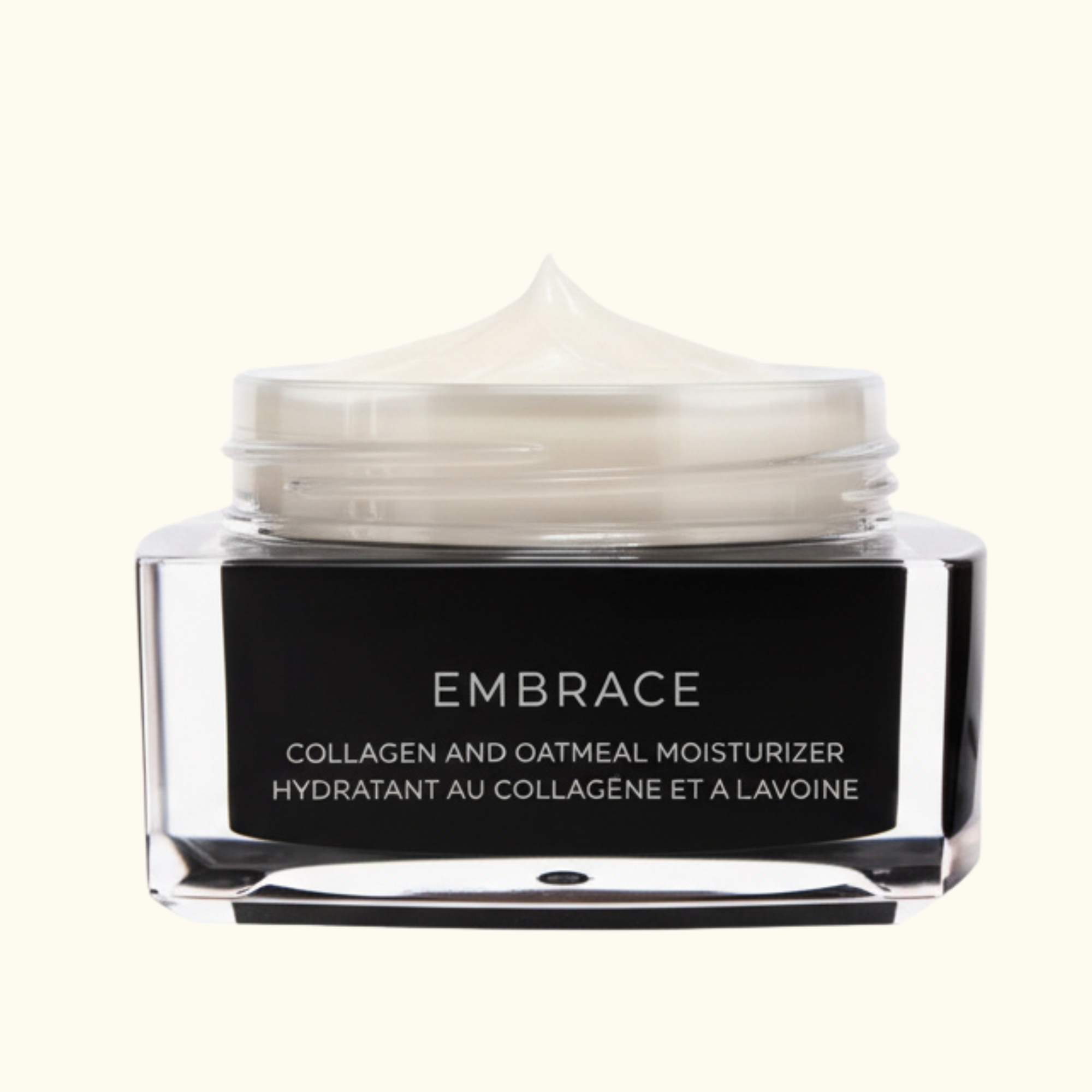 Collagen and oatmeal moisturizer jar with visible cream on a white background