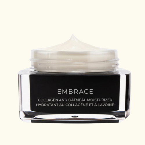 Collagen and oatmeal moisturizer jar with visible cream on a white background